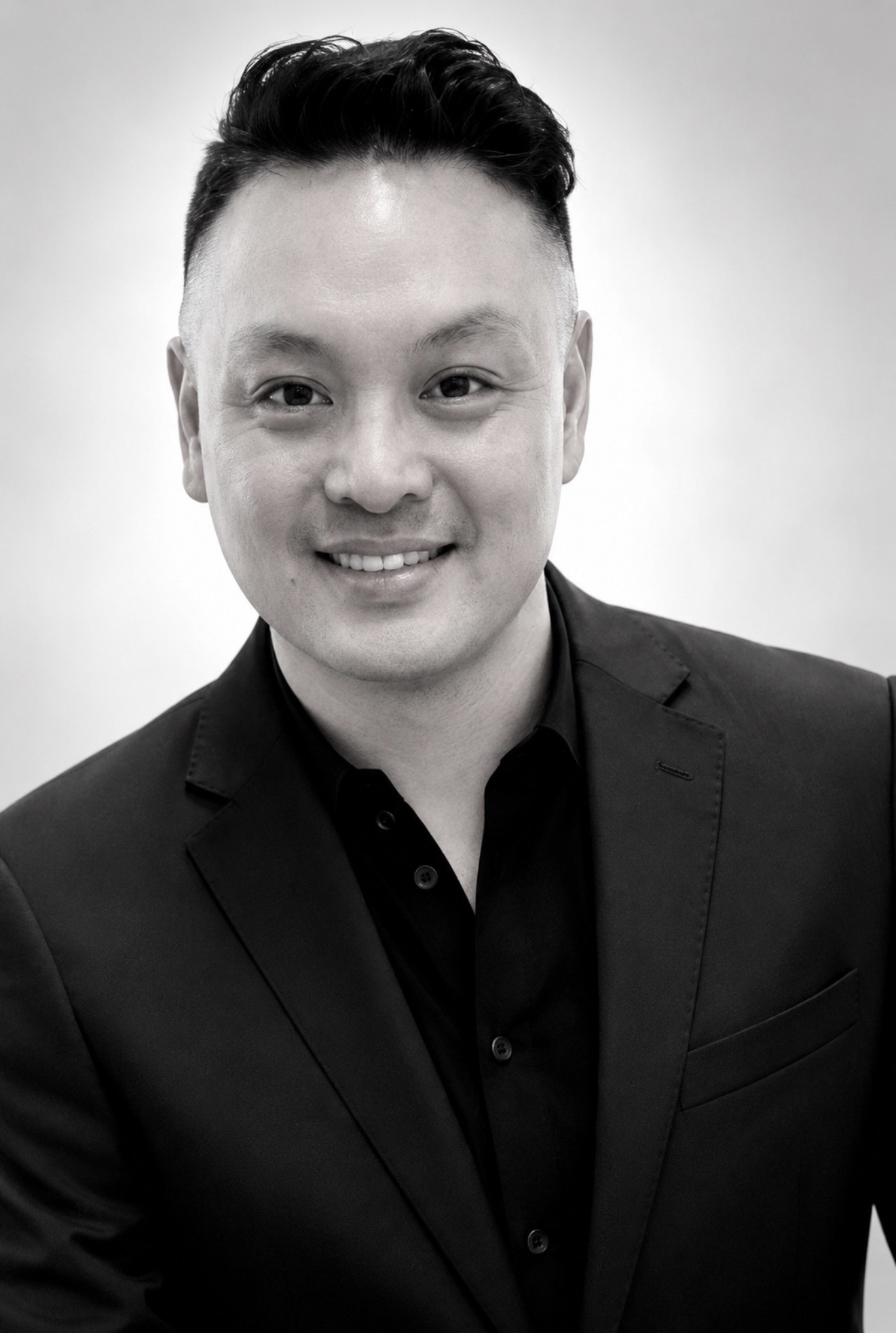 Jordan Caviedes-Chua headshot seen from the chest up Jordan Caviedes-Chua headshot seen from the chest up